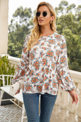 Chemisier péplum à manches longues et motif cachemire floral