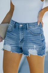 Short en jean usé à ourlet effiloché avec poches