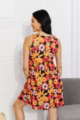 Robe fleurie sans manches Yelete avec poches
