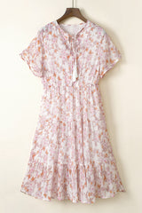 Gestuftes Kleid mit Blumenmuster, Quaste und Krawatte