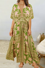 Robe longue fendue à manches dolman et décolleté en V profond