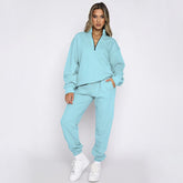 Ensemble deux pièces élégant avec pull à manches longues et col zippé de couleur unie