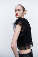 Schwarze Strickweste mit laminierter Dekoration und acht Streifen