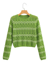 Pull court en tricot vert à texture découpée et ajourée