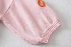 Pull rose à col rond et manches tombantes en maille brodée de fleurs