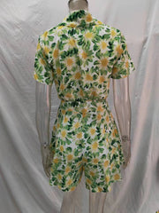 Kurzärmliger Strampler mit Blumenmuster und Schleife