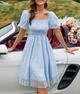Schwarzes lockeres Büro-Polka-Midikleid mit hoher Taille