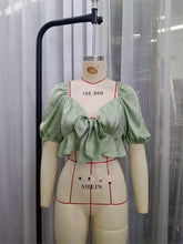 Haut chemise ultra court à lacets et manches bouffantes coupe slim