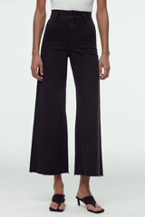 Pantalon large à lisière brute en noir, coupe slim, taille haute, coupe droite