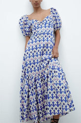 Robe mi-longue à smocks et lacets imprimés sur la poitrine