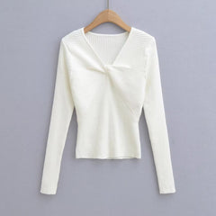 Pull en tricot à manches longues et col en V avec nœud torsadé de couleur unie