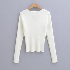 Pull en tricot à manches longues et col en V avec nœud torsadé de couleur unie