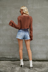 Pull court à motif ondulé ajouré de couleur unie