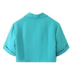 Ensemble deux pièces décontracté avec haut à col et manches courtes et short taille haute de couleur unie