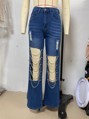 Jeans déchirés anciens, ornements de chaîne, pantalons droits
