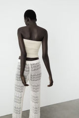 Haut tube tricoté à poitrine enveloppée d'un mot français