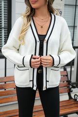 Pull grande taille avec poches assorties et col en V