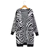 Cardigan tricoté ample à col en V et longue section au-dessus du genou