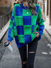 Pull ample à motif cochon bicolore