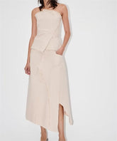 Ensemble jupe-collant asymétrique effiloché