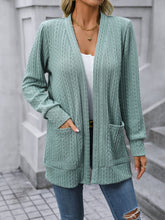 Cardigan mi-long en tricot torsadé à col châle ample de couleur unie