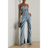 Ensemble deux pièces en jean délavé avec haut tube en patchwork de couleurs contrastées, fente tridimensionnelle, double fermeture éclair et coutures élastiques