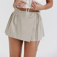 Jupe courte de couleur unie, jupe trapèze, jupe à lacets sur le côté