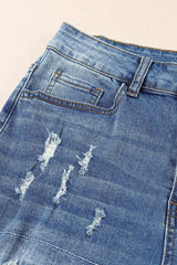 Jean taille moyenne à carreaux patchwork effet usé