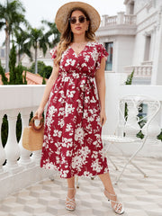 Robe mi-longue à col surplis et taille nouée à fleurs grande taille