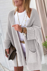 Cardigan gris surdimensionné en maille torsadée avec poches et manches chauve-souris