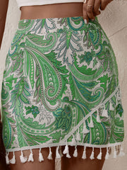 Short imprimé à ourlet à pompons