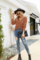 Pull col V en maille gaufrée avec cordon de serrage