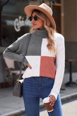 Rollkragenpullover mit Farbblockdesign und überschnittener Schulter