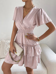 Robe imprimée à col surplis et manches bouffantes