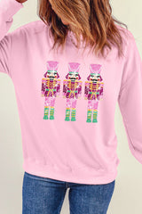 Rosa Sweatshirt mit Rundhalsausschnitt und Weihnachts-Nussknacker-Grafik