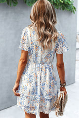 Robe imprimée à manches flottantes et col en V