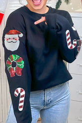 Schwarzes Sweatshirt mit Rundhalsausschnitt und Weihnachtsmuster und Pailletten
