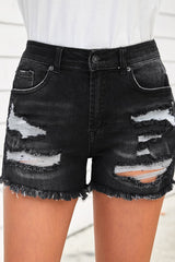 Short en jean usé à ourlet brut avec poches