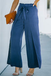 Pantalon large à taille froncée et ceinture à nouer sur le devant