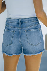 Short en jean usé à ourlet effiloché avec poches