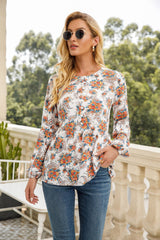 Chemisier péplum à manches longues et motif cachemire floral