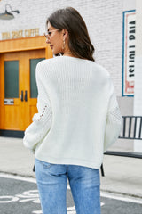 Pull ajouré à col en V et épaules tombantes