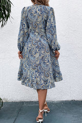 Robe imprimée à manches ballon et décolleté plongeant