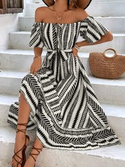 Robe midi imprimée à épaules dénudées et ceinture nouée