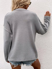 Pullover mit Knopfleiste und sichtbaren Nähten