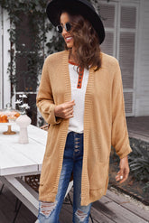 Cardigan long ouvert sur le devant avec coutures apparentes et poches