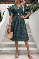 Robe imprimée à taille froncée et poignets noués