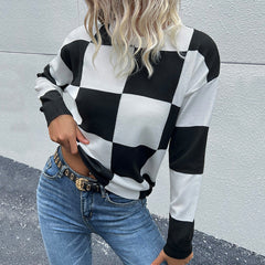 Pull en tricot à carreaux et épaules tombantes