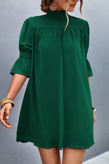 Robe à col volanté et manches volantées