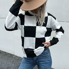 Pull en tricot à carreaux et épaules tombantes